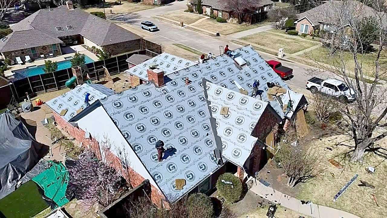 Gregory Group Roofing at work in Corinth, TX